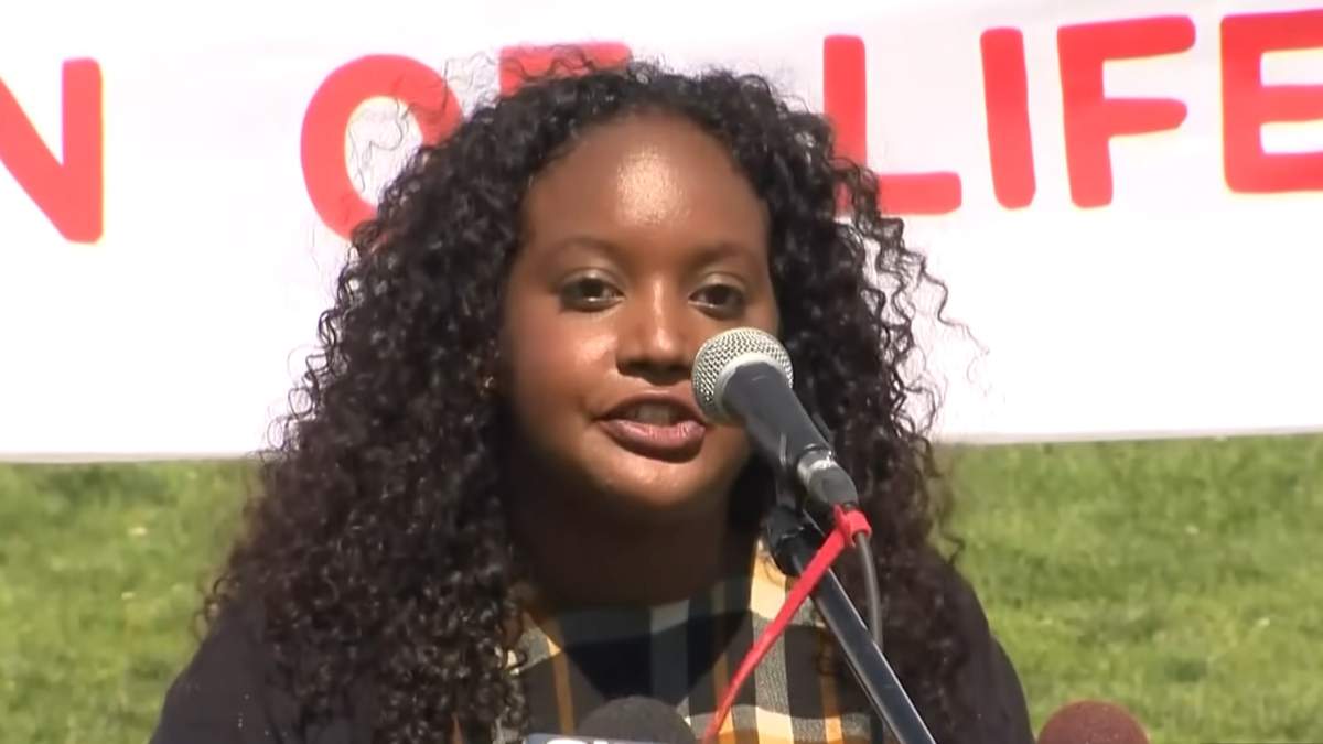 Sarah Jama speaking into mic