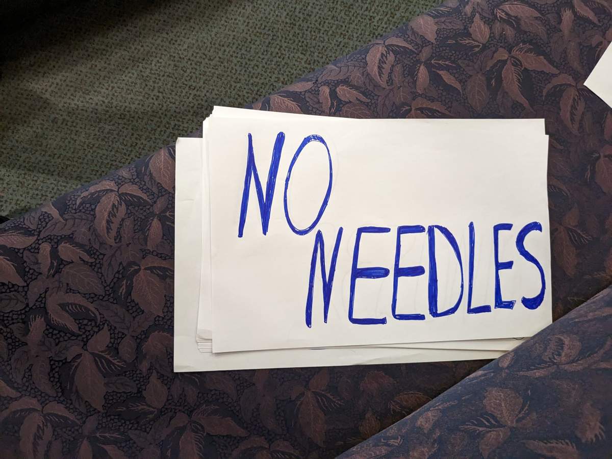 A sign left in the public gallery following a special council meeting in London, Ont., on Thursday Oct. 5, 2023.