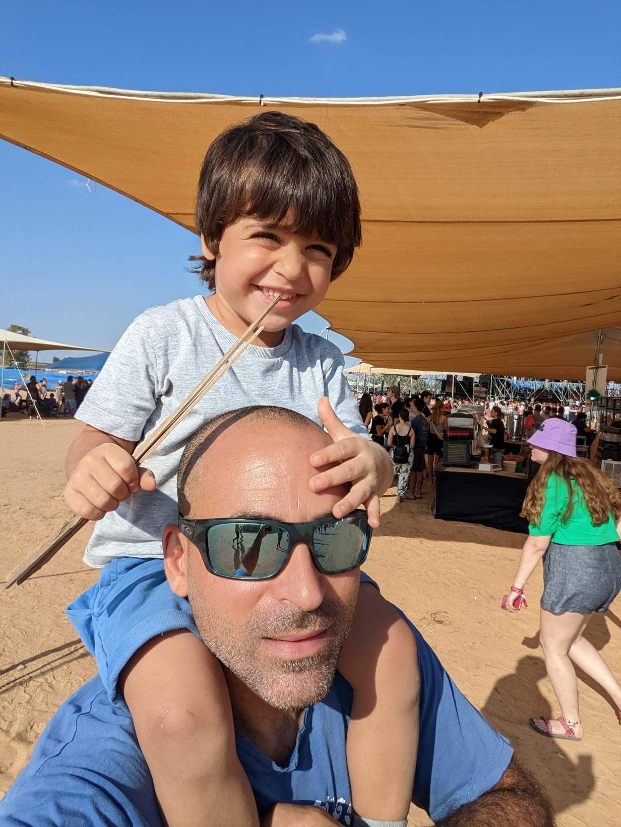 Avihai Brodutch and son, who may be among 200 Israeli prisoners held by Hamas.