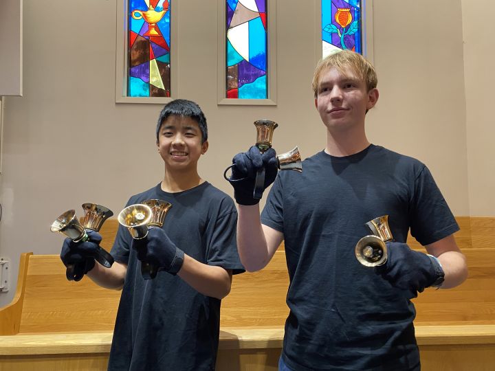Brayden Kwan and Eddie Hergott AKA 'The Handbell Hotshots' practice their skills ahead of a major anniversary celebration.