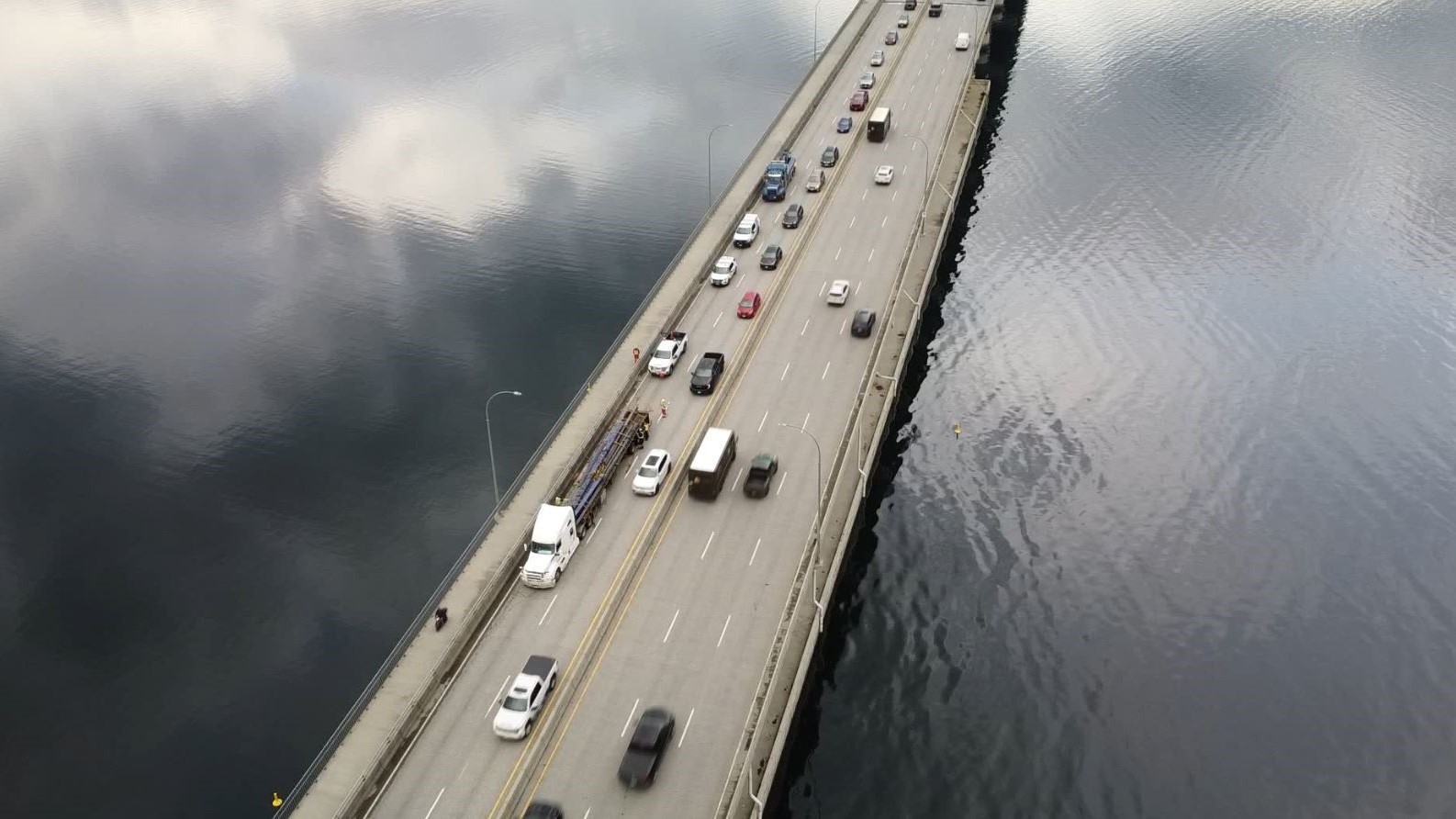 Semi truck blocking traffic along W.R. Bennett Bridge in Kelowna