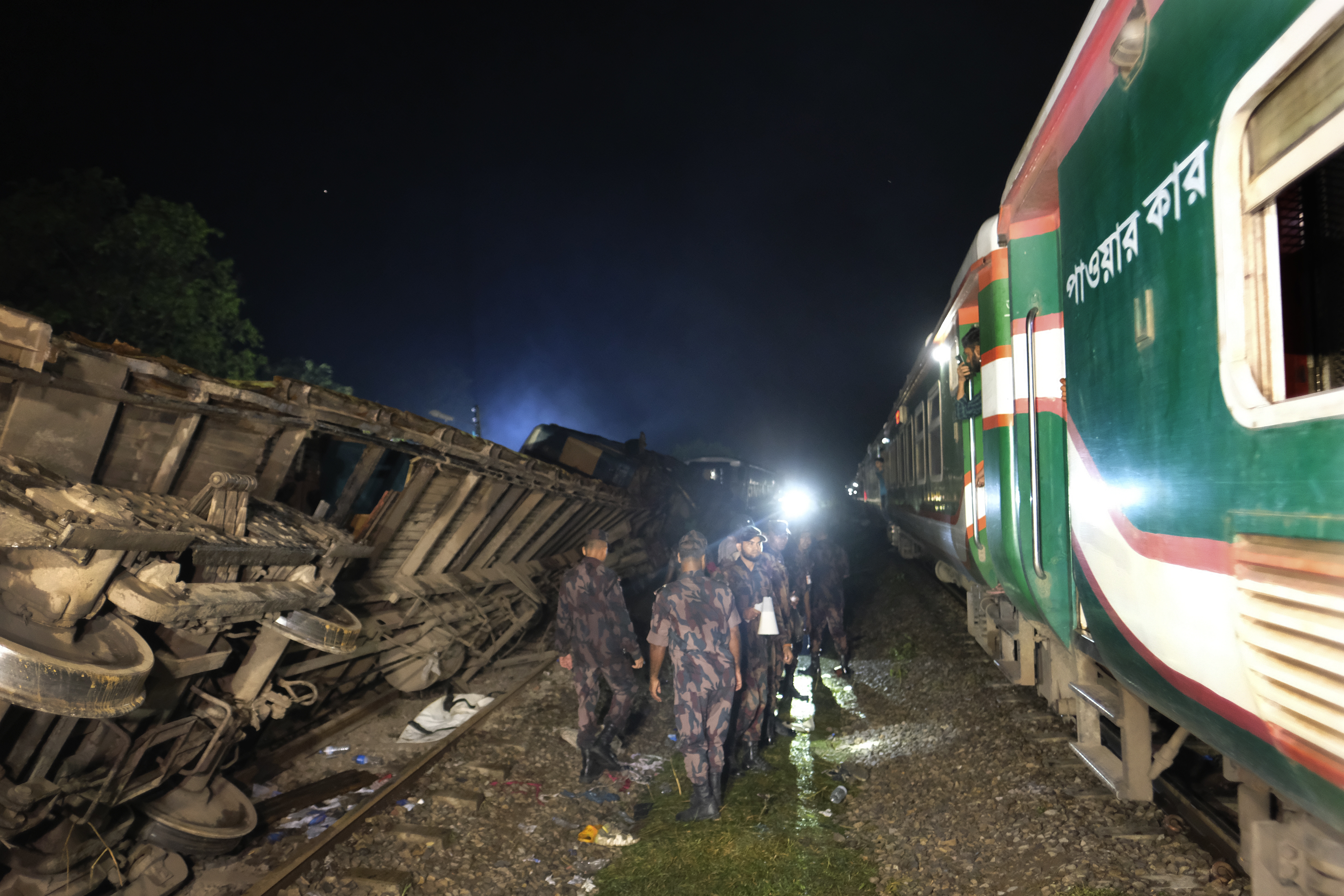 At least 17 killed in Bangladesh train collision, police say many
injured