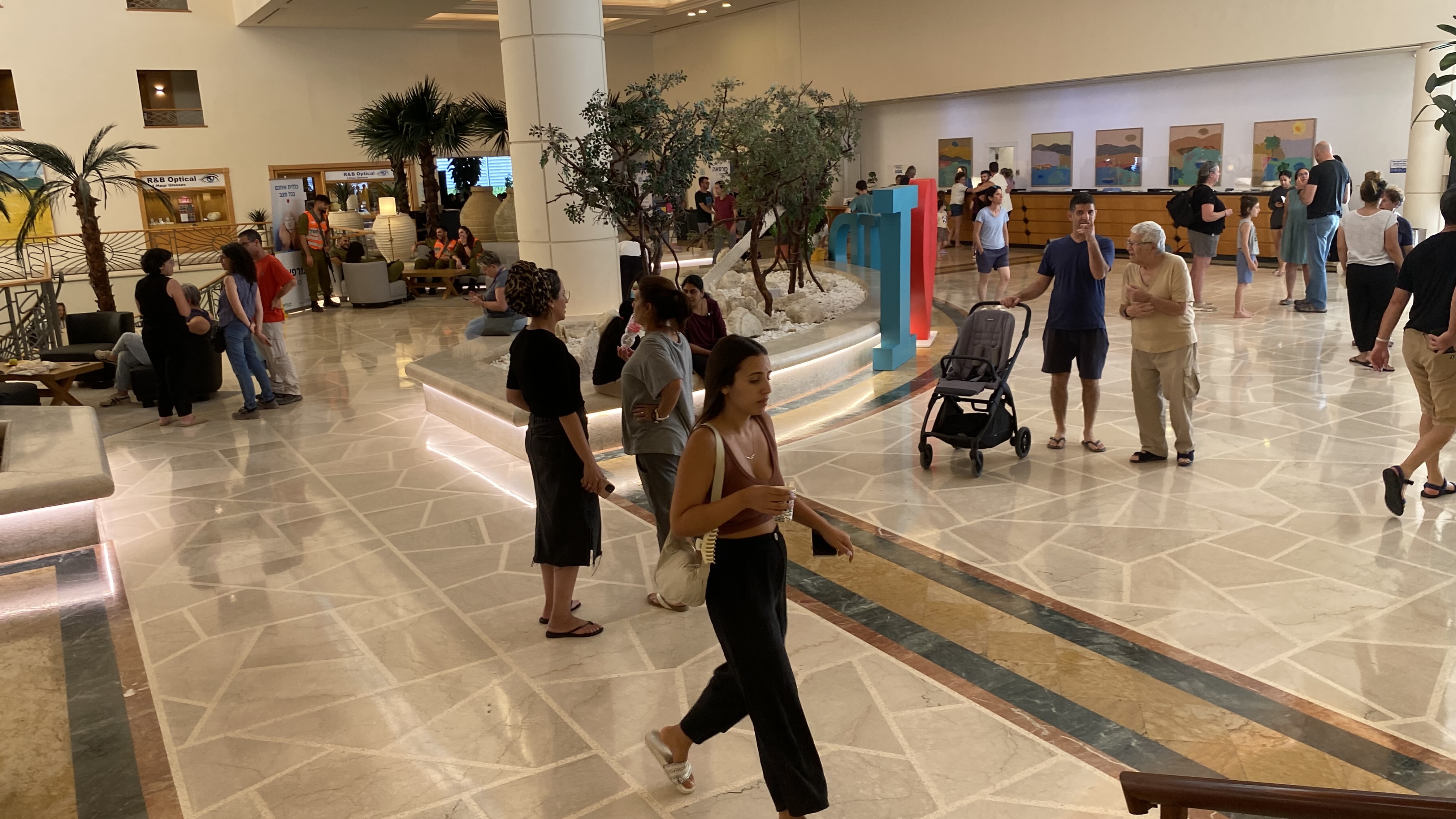 Survivors of the Oct. 7 Hamas attack on the Be’eri kibbutz in southern Israel, in the lobby of a Dead Sea resort.