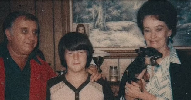 Alan Glatzel is pictured with paranormal investigators, Lorraine and Ed Warren.
