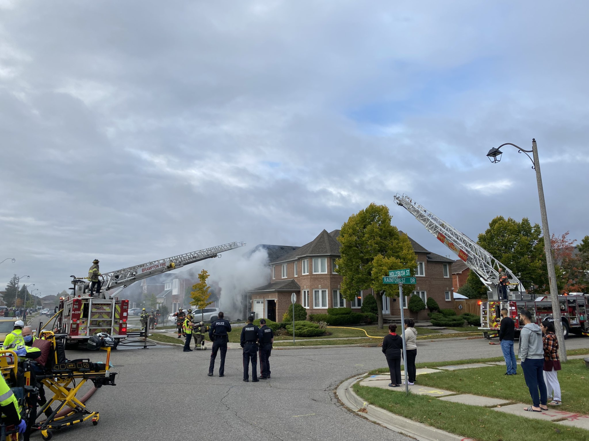 Firefighters on the scene of a Brampton fire reported around 9:40 a.m. on Oct. 21, 2023.