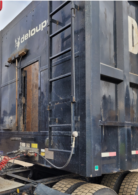 A video shows Lagace entering this door while the truck was being cleared.