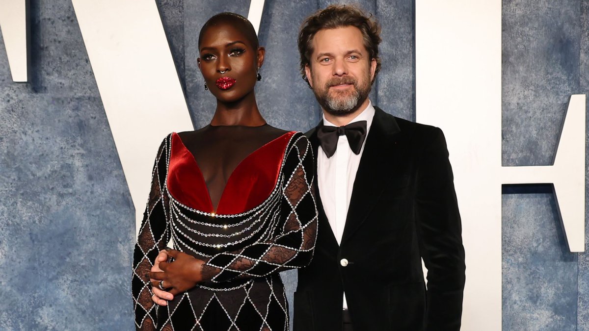 Jodie Turner-Smith and Joshua Jackson on a red carpet.