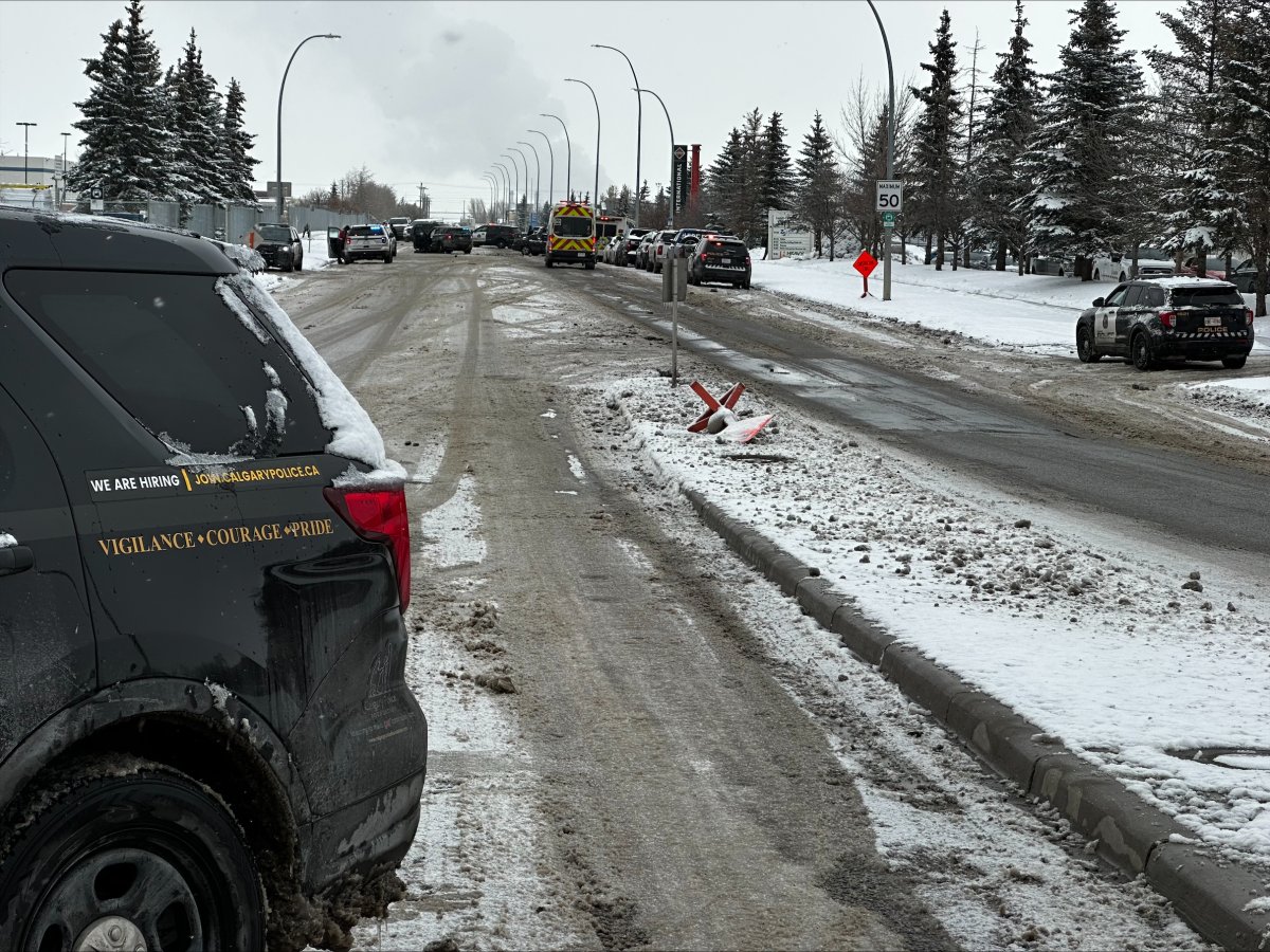 A southeast Calgary is closed after a police officer was injured in a two-vehicle crash on Wednesday afternoon.