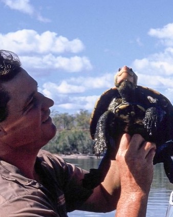 Steve Irwin poses with one of the Irwin's turtles he discovered back in 1990.