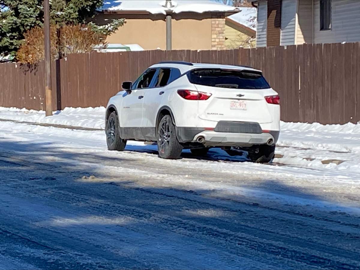 The suspect vehicle in an Oct. 27 shooting in Pineridge was found abandoned several blocks away. Someone had attempted to set the interior of the vehicle on fire.