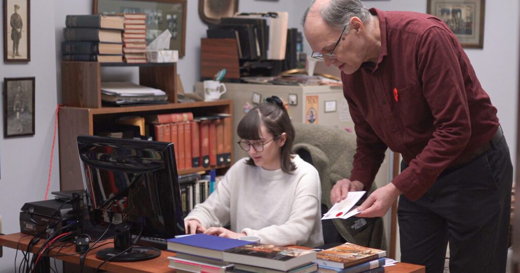[Left]: Bailey Ashton, a fourth-year history student, worked with professor Jonathan Vance as one of three research assistants on the postcard project.