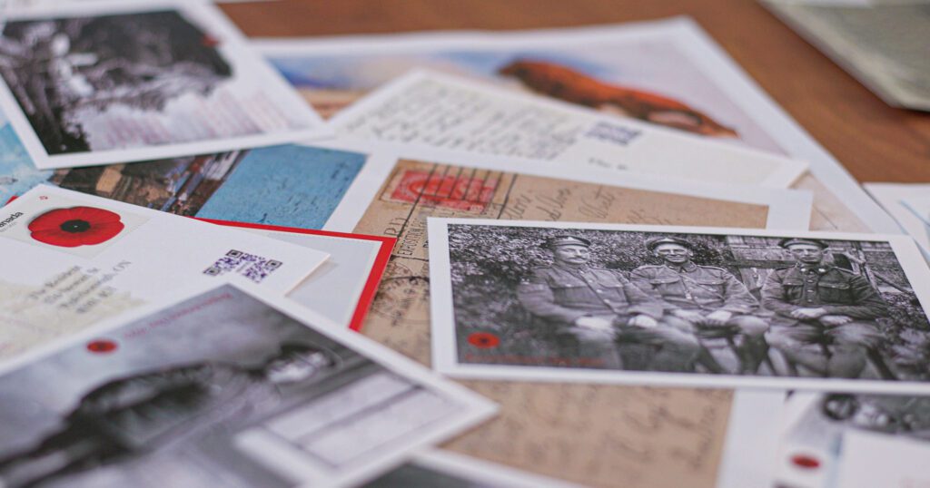 Each replica postcard contains information about the person who originally wrote or is pictured on the card.