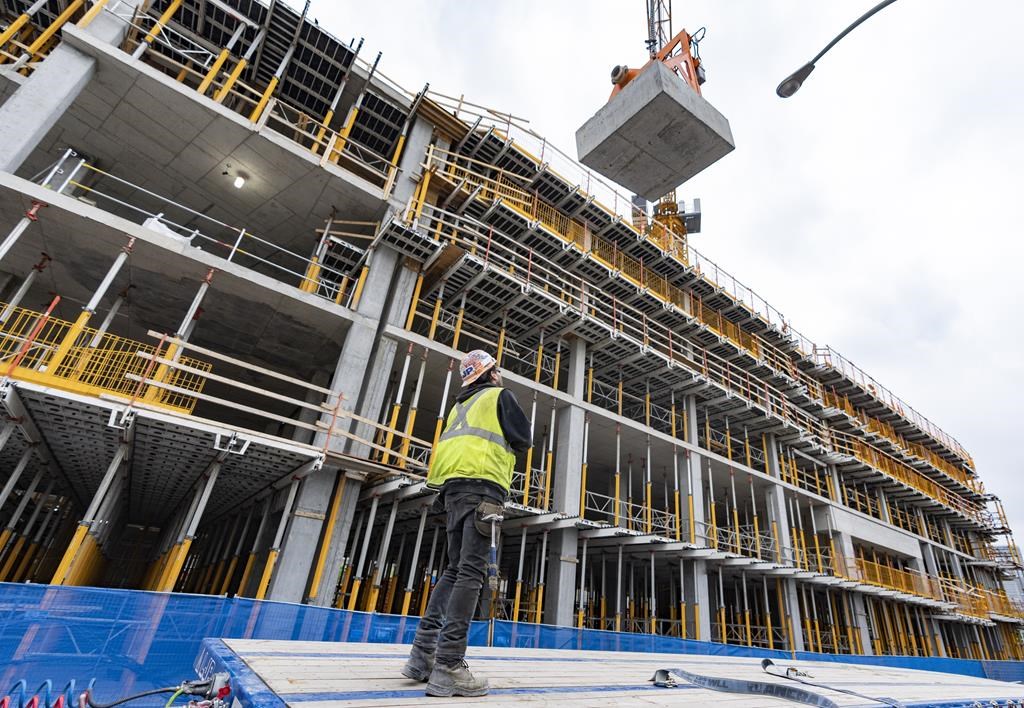Cadillac Fairview says it will construct two towers in downtown Montreal as rental apartments, rather than its original plan to make them office space. A new condo site under construction in Montreal, Friday, June 9, 2023. 
