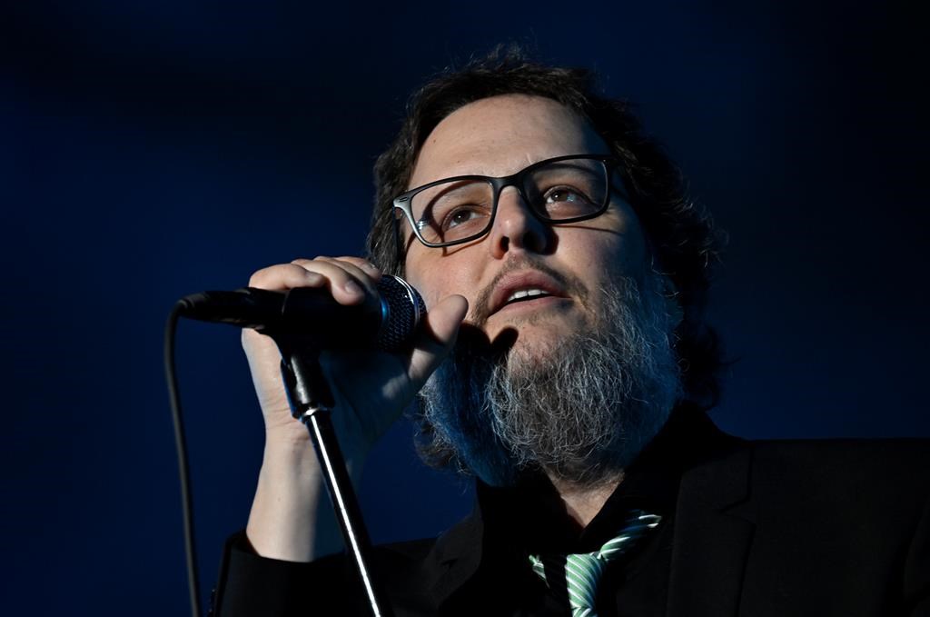 Les Cowboys Fringants lead singer Karl Tremblay performs at the Quebec Summer Festival, in Quebec City on Monday, July 17, 2023. Quebec Premier François Legault is offering the family of Tremblay a national funeral to commemorate the renowned singer, who died on Wednesday at the age of 47. 
