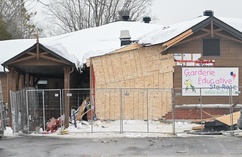 The scene outside a daycare centre in Laval, Que. is shown on Thursday, Feb.9, 2023, after a bus crashed into the building, killing two children. The preliminary hearing for a man accused of driving a city bus into a Laval, Que. daycare, killing two children, will begin March 25.THE CANADIAN PRESS/Graham Hughes.