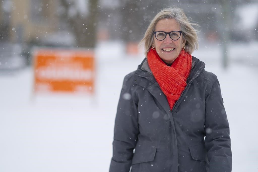 Debbie Chapman, the New Democratic Party’s candidate in the Nov. 30th Ontario byelection for MPP Kitchener Centre, canvasses door to door in Kitchener, Ont., Tuesday, Nov. 28, 2023. THE CANADIAN PRESS/Peter Power.