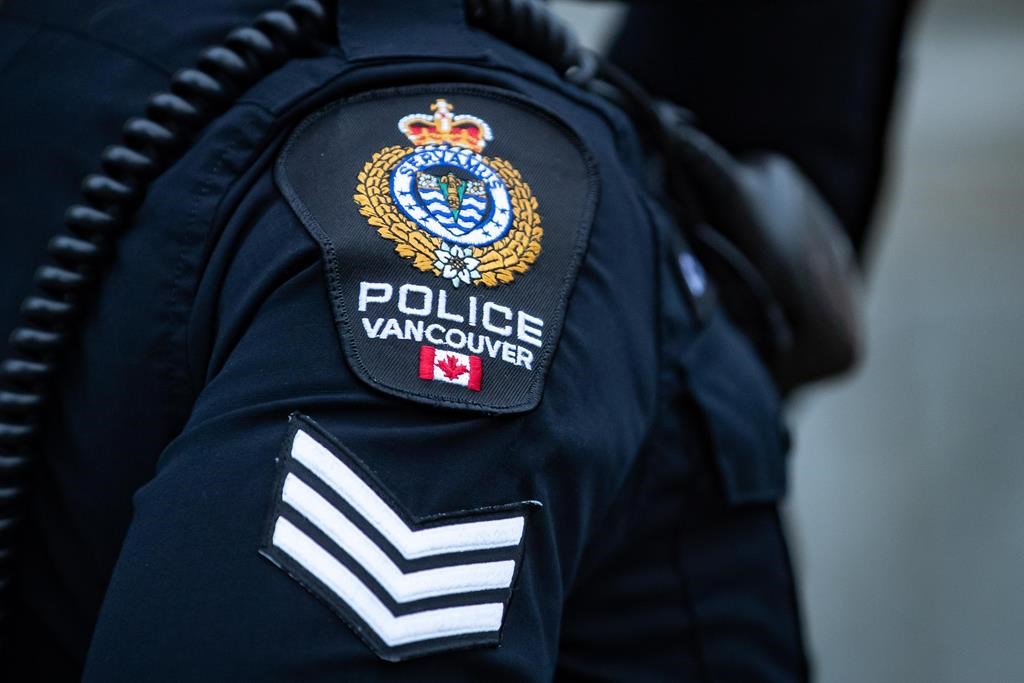 FILE - A Vancouver Police Department patch is seen on an officer's uniform. The Independent Investigations Office of BC said it is looking into the Vancouver police's role in the circumstances of a death that occurred outside St. Paul’s Hospital in May 2022.