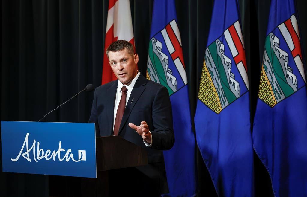 Alberta Finance Minister Nate Horner speaks to the media at a news conference in Calgary on Thursday, June 29, 2023. Alberta’s budget surplus is growing but will be offset by more than $1 billion this year to pay for floods, forest fires and drought. THE CANADIAN PRESS/Jeff McIntosh