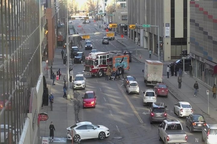 Pedestrian hit by vehicle, stymieing downtown Calgary traffic