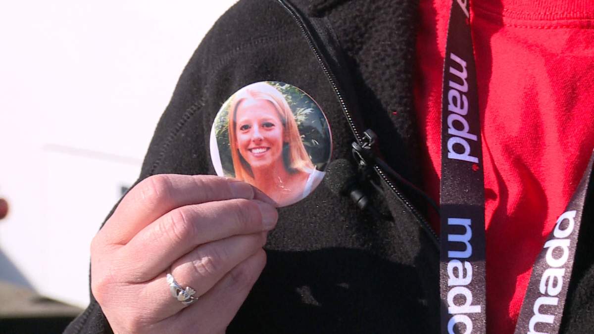 photo of woman printed on a button