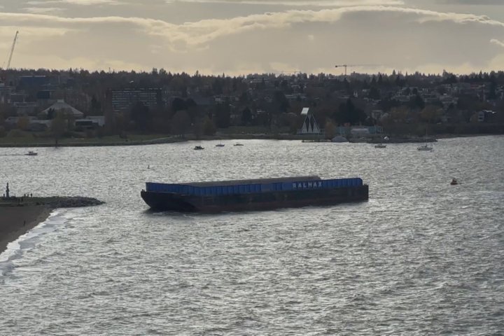 Runaway barge wrangled from hitting Vancouver’s English Bay Beach