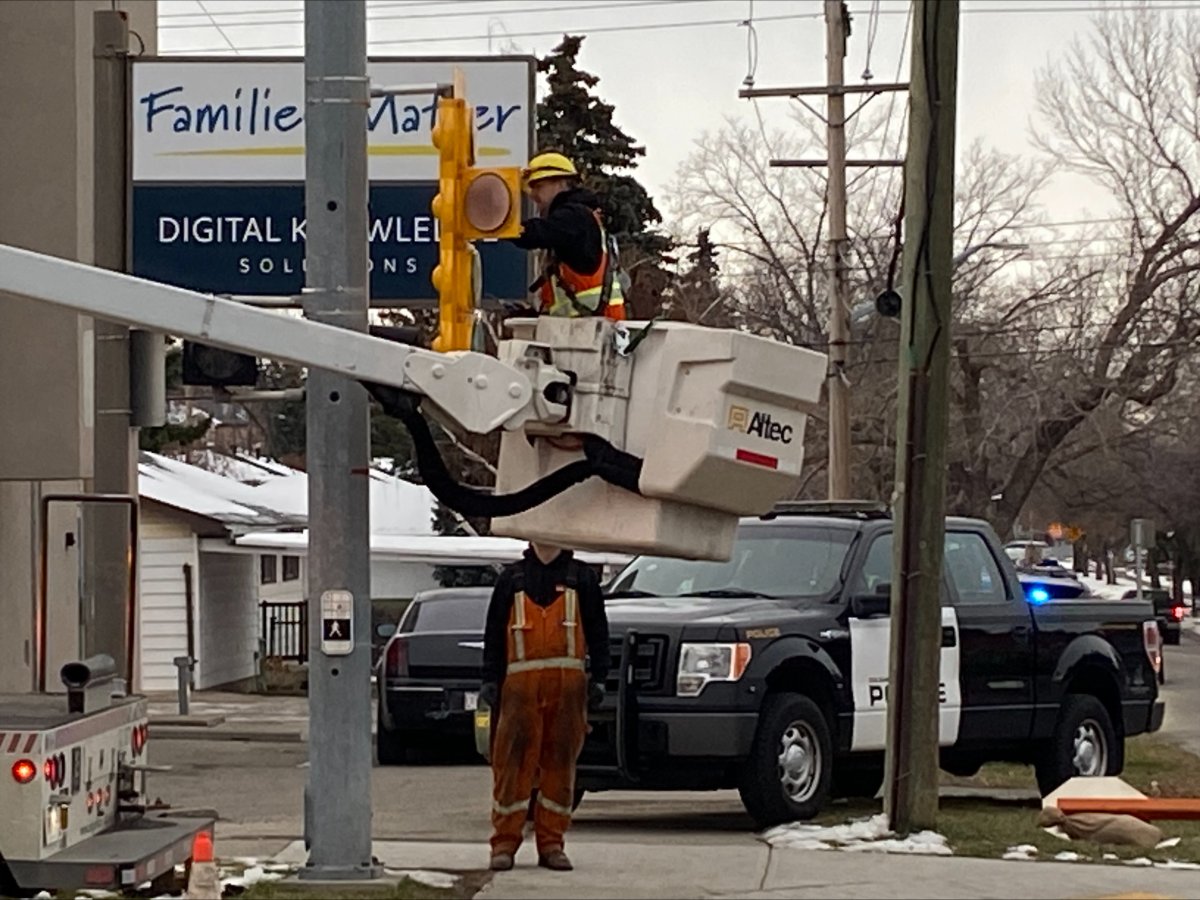Calgary police are investigating an early morning collision between a Calgary Transit bus and an overhead signage pole.