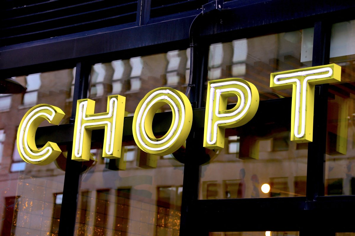 Chopt brand logo on the street in New York City, NY, USA on January 18, 2022. Chopt has been sued after a woman allegedly bit into a piece of a human finger mixed up in a salad she purchased from the eatery.