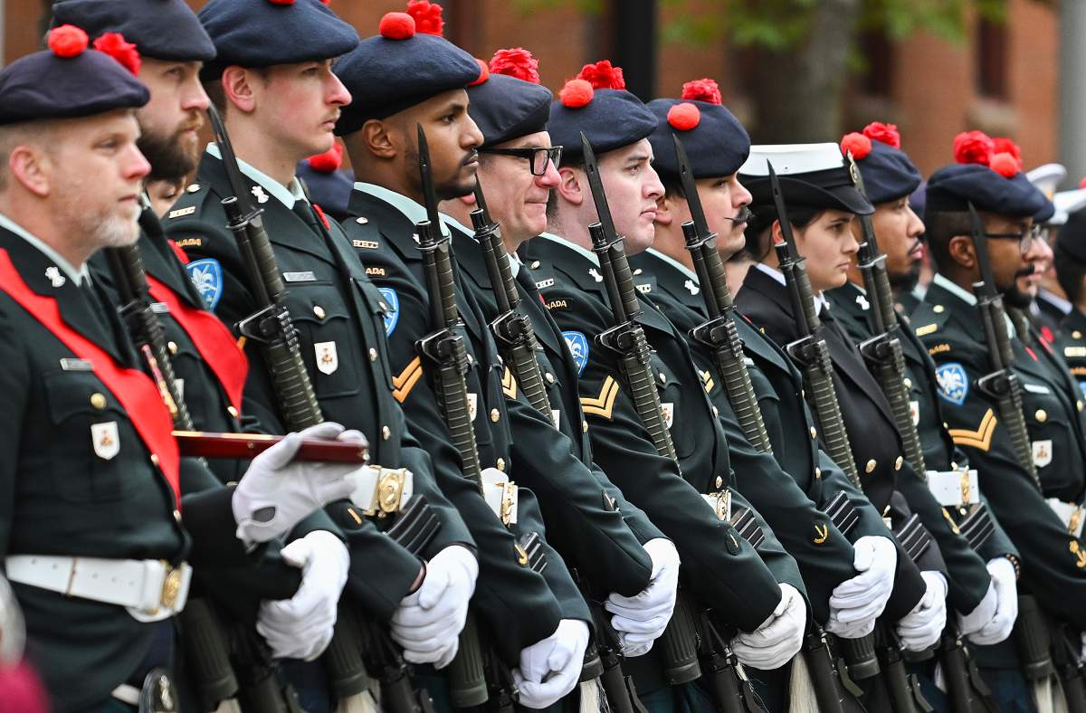 Members of the Canadian Armed Forces stand to attention during a Remembrance Day ceremony in Montreal, Saturday, November 11, 2023.