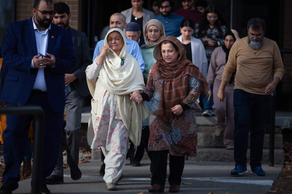 People seen leaving a courthouse on Nov. 16, 2023.