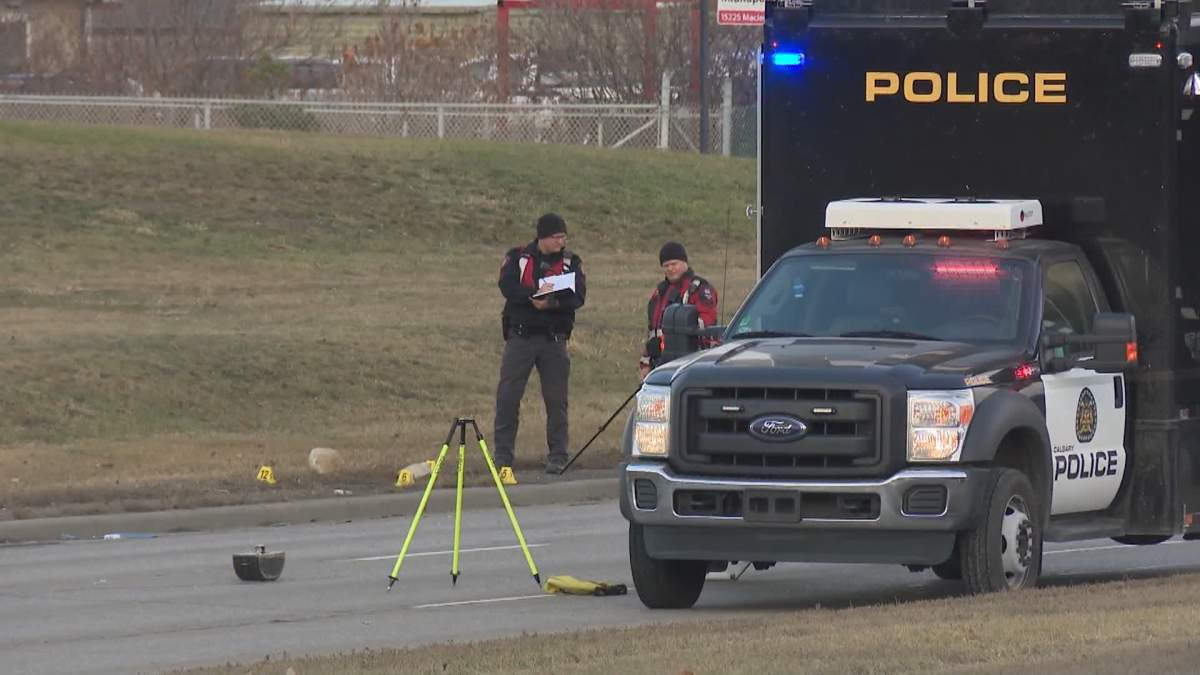 CPS members and evidence markers on Macleod Trail during the investigation into a Nov. 22 collision that sent a cyclist to hospital.