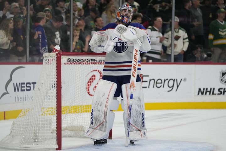 Edmonton Oilers goaltender Jack Campbell reacts after a goal by the Minnesota Wild during the first period of an NHL hockey game Tuesday, Oct. 24, 2023, in St. Paul, Minn.