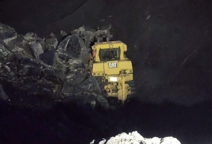 This dozer operated in the CST Coal mine in Grand Cache, Alta. was partially buried in an October 2022 "wall instability." The operator was unhurt but badly scared. Alberta's energy regulator is currently reviewing practices at the mine after three additional instabilities in June, September and October. THE CANADIAN PRESS/HO-United Mine Workers **MANDATORY CREDIT**