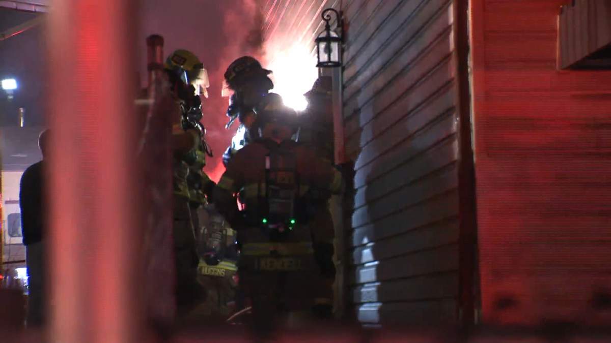 Firefighters battle a blaze in Forest Lawn Thursday night.