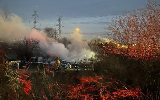 Fire crews in London, Ont., received multiple reports of a large encampment fire in the area of Adelaide Street South and Royce Court around 5:15 p.m. on Wednesday.