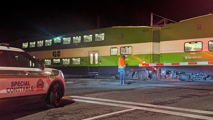 Toronro police arrested a woman after a GO train struck a vehicle November 17.