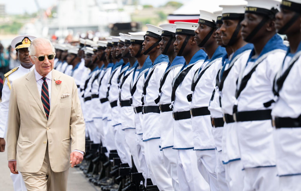 King Charles III walks through the Guard of Honour from members of the Kenya Navy during a visit to Mtongwe Naval Base where they will witness the Kenya Marines trained by the Royal Marines on November 02, 2023 in Mombasa, Kenya. King Charles III and Queen Camilla are visiting Kenya for four days at the invitation of Kenyan President William Ruto, to celebrate the relationship between the two countries. The visit comes as Kenya prepares to commemorate 60 years of independence.  
