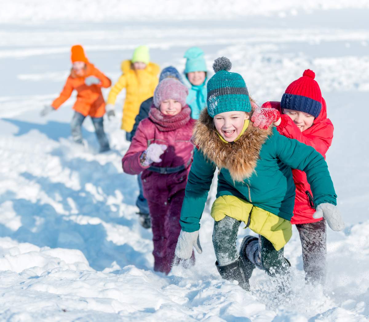 kids playing outside in winter