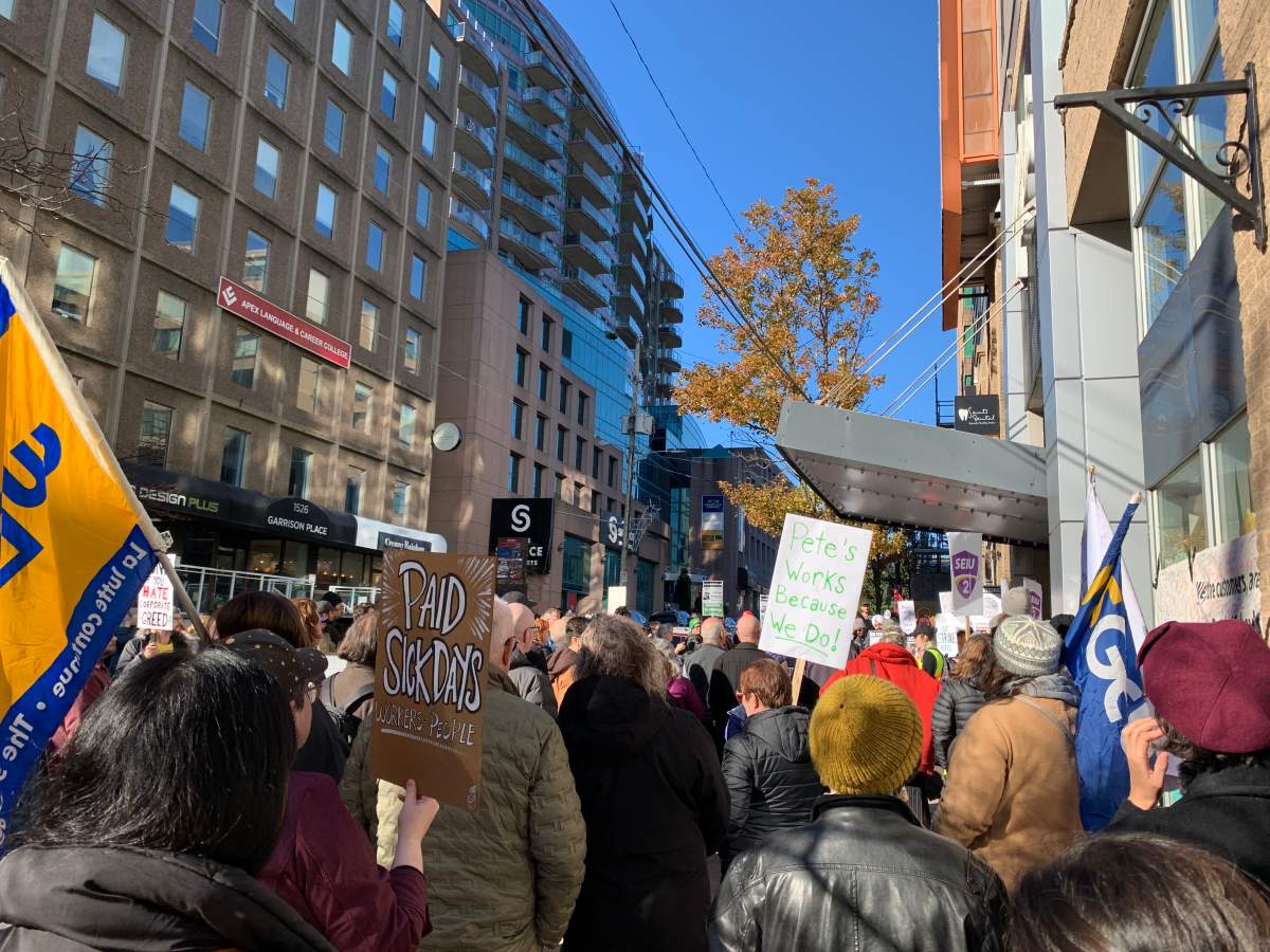 A sign reading “Pete’s works because we do” is held outside the store’s main entrance on Sunday.
