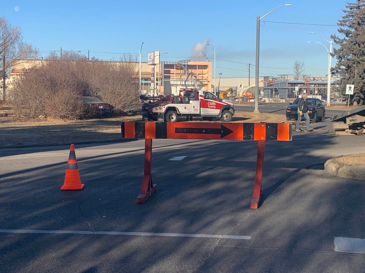Three-vehicle collision closes traffic circle in Edmonton at 107 Avenue and 142 Street on Thursday, Nov. 30, 2023.