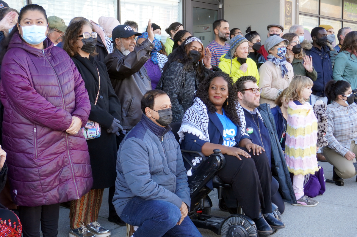 MPP Sarah Jama is flanked by supporters in front of her revamped, now-Independent constituency office.