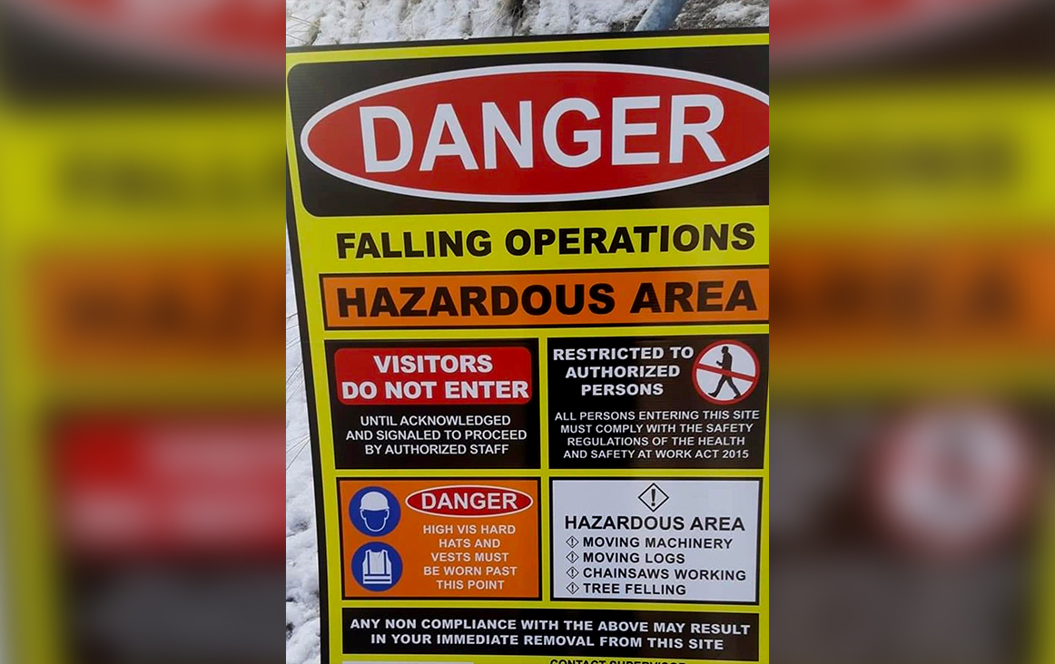 A sign warning the public of wildfire mitigation work.