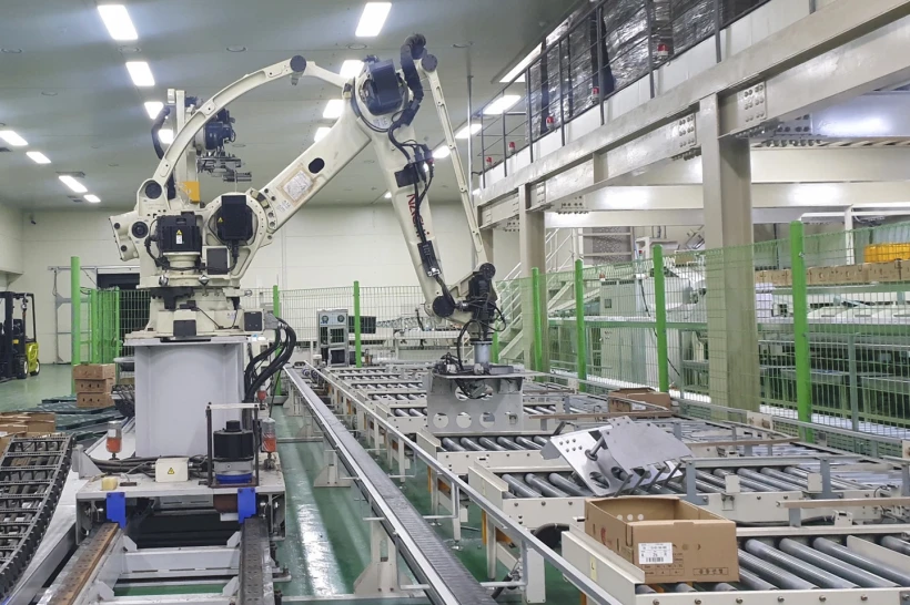 A robotic arm in a factory.