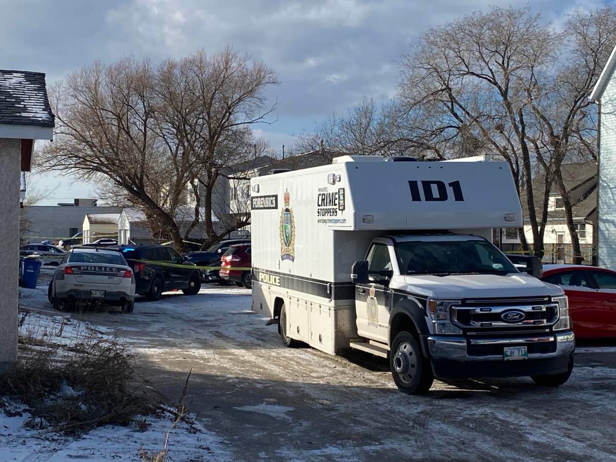Winnipeg police at the scene of a shooting Tuesday.