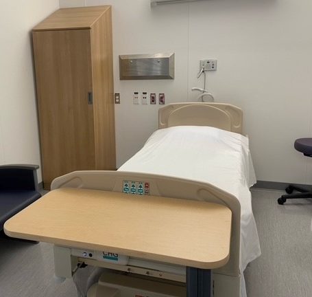 A hospital bed is shown.