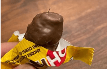 Police shared this image of a needle sticking out of an Oh Henry bar.