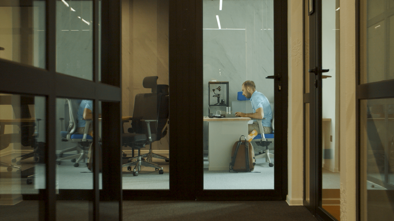 A remote worker types on his laptop at Nestwork’s largest co-working space in central Bansko.