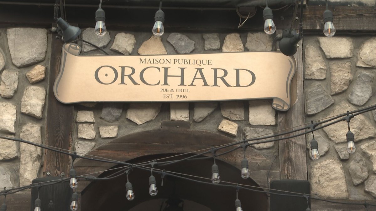 A new sign hangs over the Orchard pub and grill.