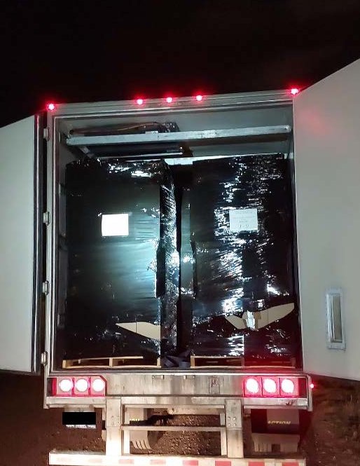 OPP say the stopped a large truck in Oakville, Ont. with millions of contraband cigarettes Nov. 20, 2023.