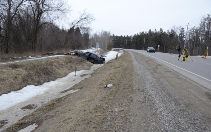 A vehicle crashes into ditch in Centre Wellington.