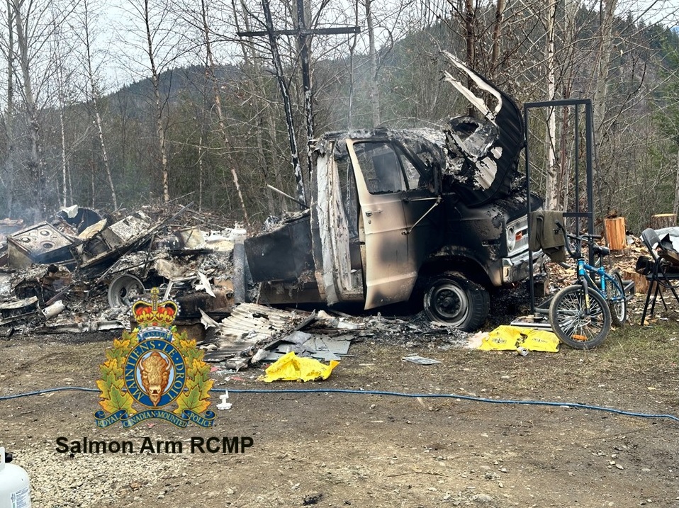 The remains of a burned motorhome along a forest service road in the Salmon Arm area.